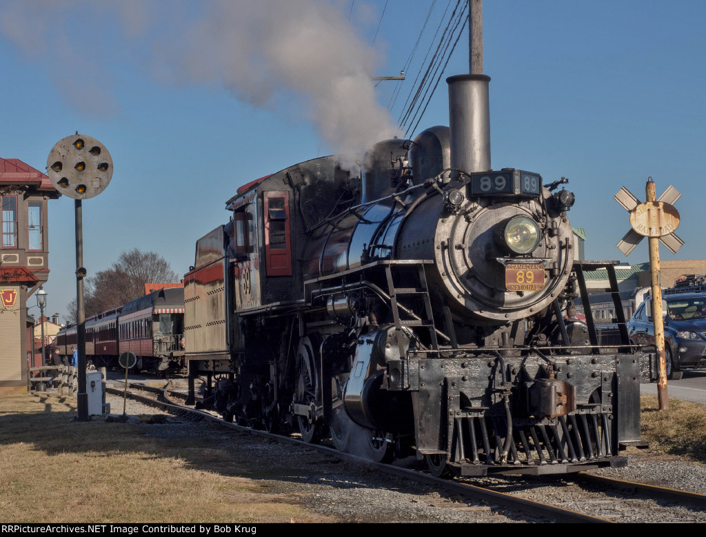 Strasburg Railroad 2-6-0 steam locomotive #89 runs around train after arriving at the depot in East Strasburg, PA